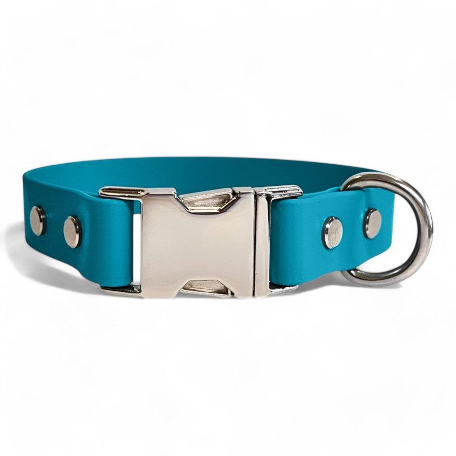 Teal blue BioThane dog collar by Dog Town Collars, featuring durable Chicago screws, a silver buckle clasp, and a sturdy D-ring for tags or leashes.